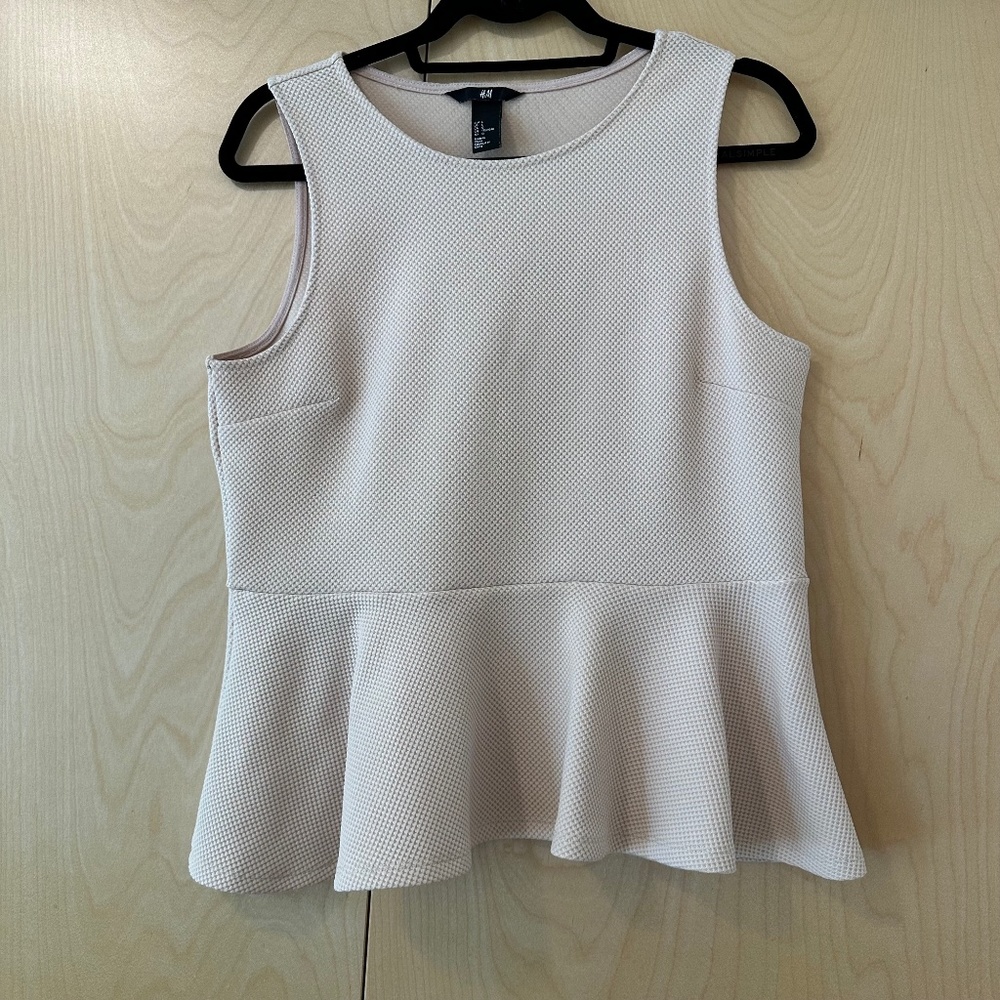 H&M blush pink textured peplum top